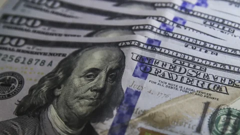 Moeda recua abaixo de R$ 5,20 com recompra de títulos nos EUA